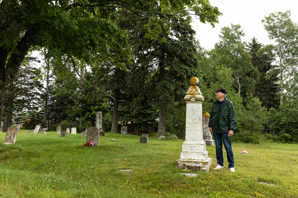 The grave of Tall Barney Beal, said to be as tall as he was. Bill Plaskon, of the local historical society, is over six feet. 